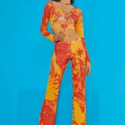 Jaded London Orange Tonal Ripped Magazine Print Mesh Trousers