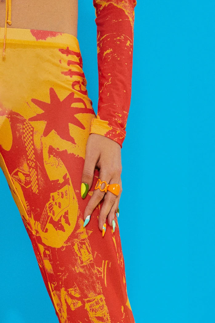 Jaded London Orange Tonal Ripped Magazine Print Mesh Trousers 2 Jaded London Orange Tonal Ripped Magazine Print Mesh Trousers