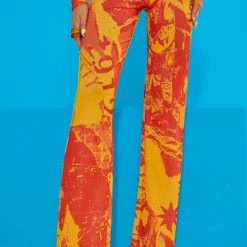 Jaded London Orange Tonal Ripped Magazine Print Mesh Trousers 8 Jaded London Orange Tonal Ripped Magazine Print Mesh Trousers